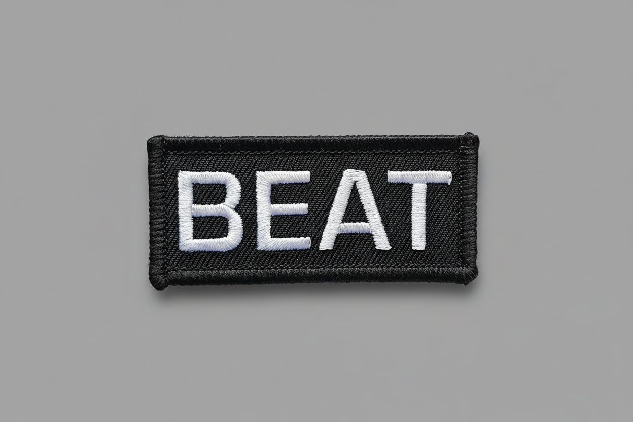 Black and white 'BEAT' patch